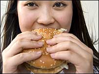 Girl eating burger