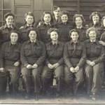 Joan and her friends in the WRAF. Joan is in the back row, 4th from the right.