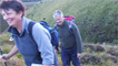Kerry and Derek reach the top of the hill and head towards the kissing fence.