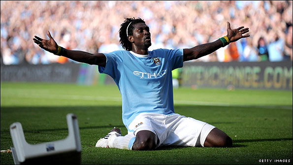 Emmanuel Adebayor celebrates his goal against Arsenal