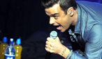 Robbie Williams performs at BBC Electric Proms 2009