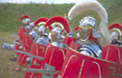 A group of Roman soldiers advancing with spears at the ready