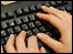 Fingers on keyboard