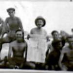 Ron and RAF colleagues celebrate with the historical VJ Day newspaper