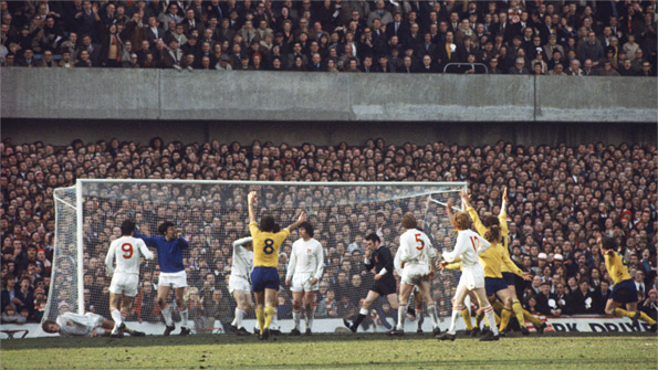 Arsenal celebrate after being awarded their last-gasp penalty in the 1971 FA Cup semi-final