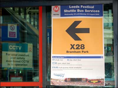 Sign for the shuttle bus