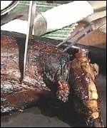 Roasted roe deer being carved