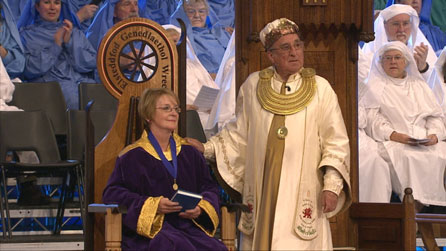 Manon presented with her winning medal.