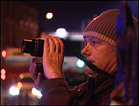 Liam Spencer taking photographs