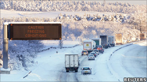 Vehicles on snow covered motorway