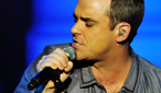 Robbie Williams performs at BBC Electric Proms 2009