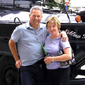 Hilary and her husband in Boston standing in front of their 'Duck'