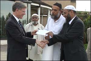 IMWS handing check to Dewsbury hospital.