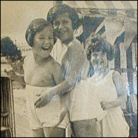 Laura and sisters on the beach