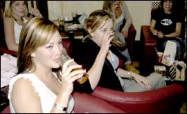 Teenage girls drinking