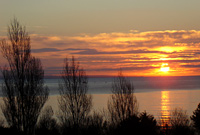 Haul yn machlud gan Aled Morris