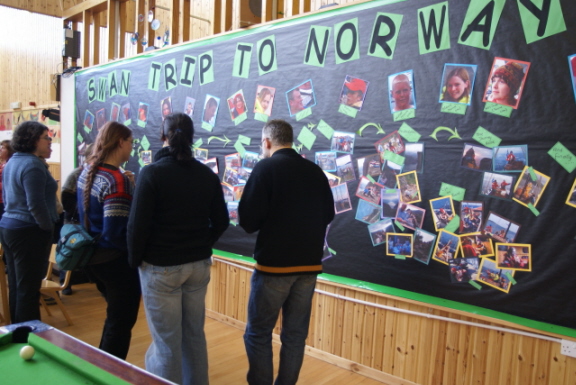 The visitors studying the display of our school trip on STV Swan to Norway last summer.