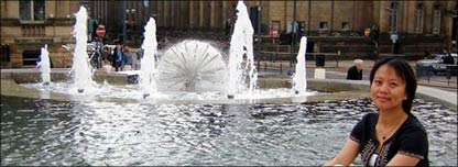 May Han Hong and water fountain in Leeds