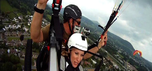 Naomi paragliding with an expert