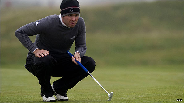 Martin Laird sizes up a putt during the Dunhill Links at St Andrews