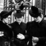 Mrs TUTTLE with her two Sons and two Daughters received the B.E.M. awarded to her Husband a rescue worker in the Civil Defence.