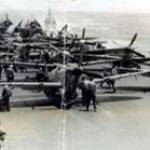 HMS Implacable (possibly early 1945). Planes getting ready to take off from the aircraft carrier.