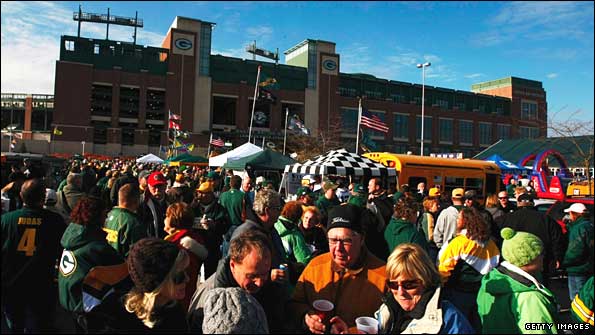 Fans tailgate around Lambeau Field