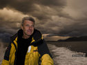 Paul Rose against a dramatic Southern Ocean skyline