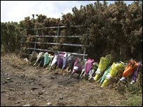 Floral tributes left at scene of fatal plane crash