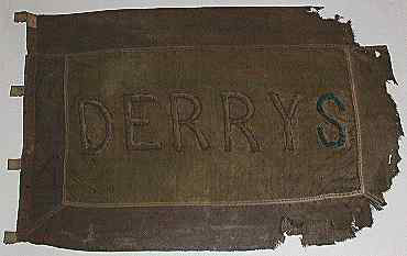 Shirts sewn together to make a 'Derrys' flag