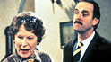Joan Sanderson as Miss Richards and Basil Fawlty
