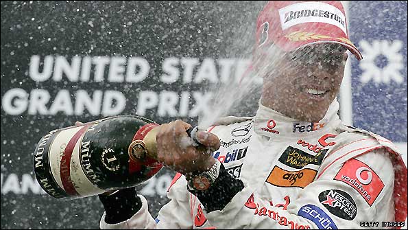 Lewis Hamilton celebrates after winning the last US Grand Prix in 2007