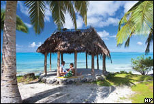 A couple on the beach on the island of Samoa