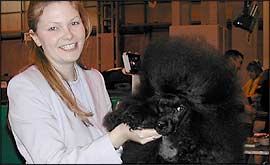 A proud owner and her dog