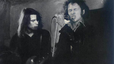 Joe Strummer playing with The Vultures