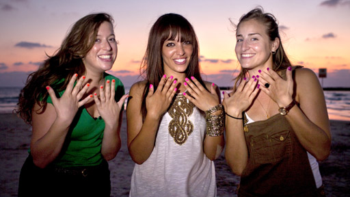 Reya meets with two young Jewish Israeli women to experience life in Tel Aviv, the 'fun capital' of Israel - starting with some retail therapy! (l-r) Keren Cohen, Reya El Salahi and Shani Scharfstein show off their new manicures on the beach in Tel Aviv.
