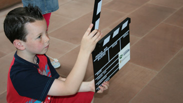 boy with clapperboard