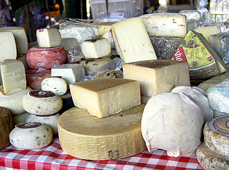 Lots of different pieces of cheese