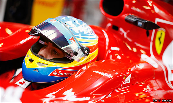 Fernando Alonso at the cockpit of his Ferrari