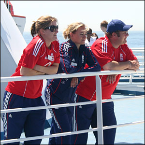 Coach Mark Lane (right), pictured with Lydia Greenway and Laura Marsh, guided the side to success during the winter