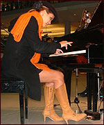 Picture: Myleene plays the piano at The Forum in Norwich