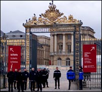 Police stand outside Versailles
