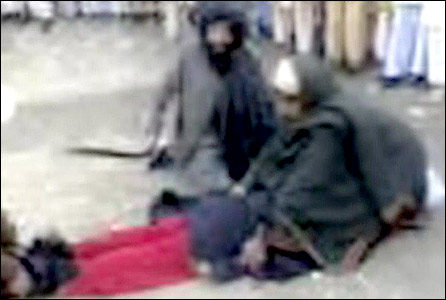 A still from a video of a teenage girl being flogged by the Taliban in the Swat Valley