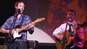 Al Cool and the Stranger Wines performing on stage