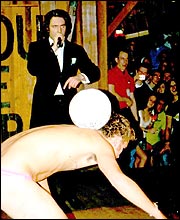 Mr Ancaster performs footy skills in his pants