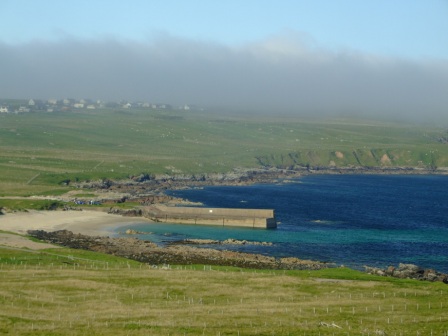 Coastal fog rolls in over Upper Bayble, Lewis
