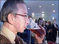 DJ Derek drinking a beer