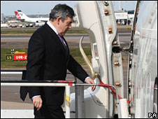 Gordon Brown boarding a plane