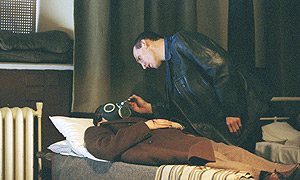 The Doctor examines a victim in episode nine