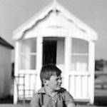 The author in front of his family's beach hut at Shoeburyness shortly before the sea-front was closed for the duration of the war